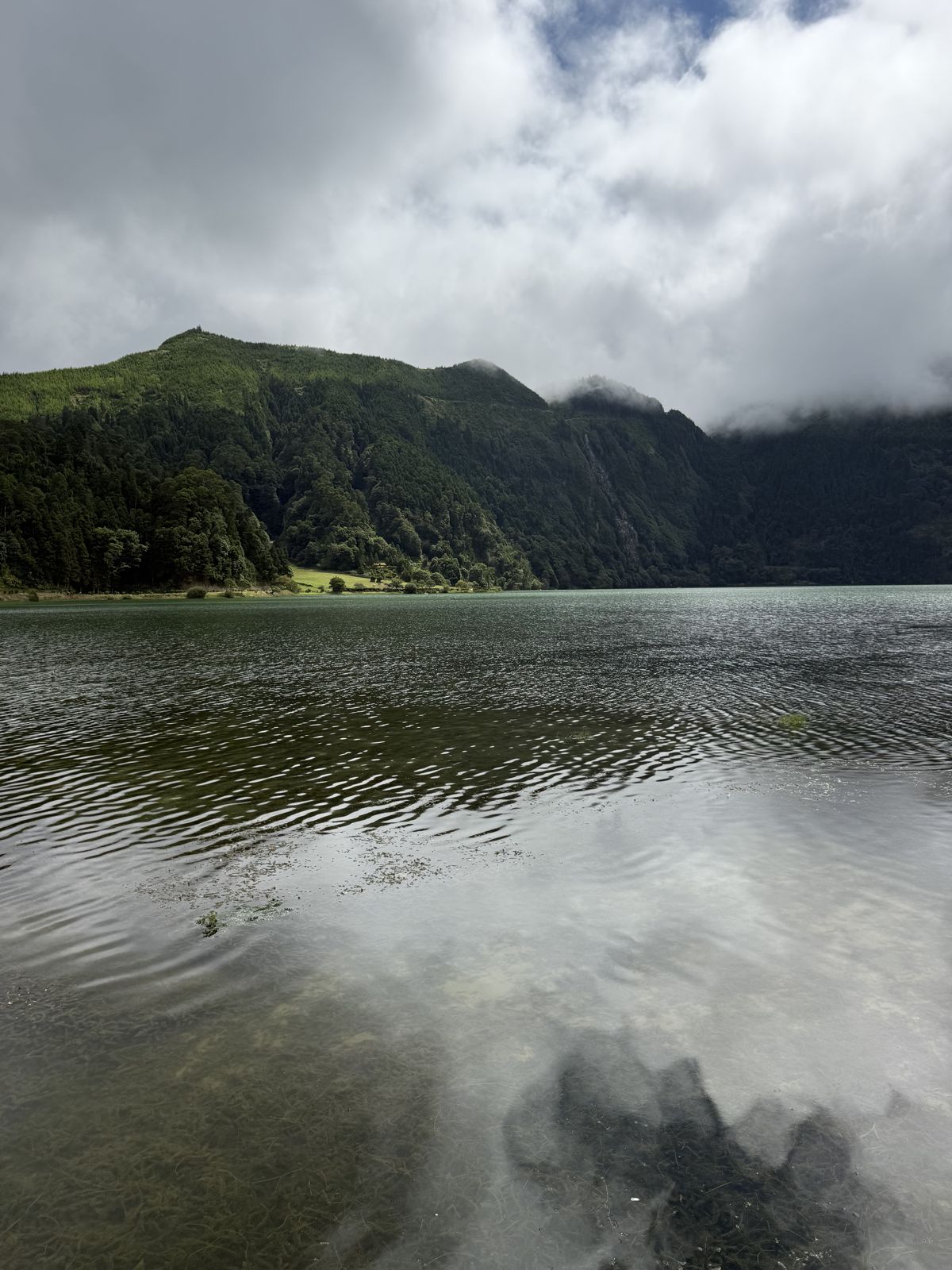 Sete Cidades crater lake with cloud over the caldera walls