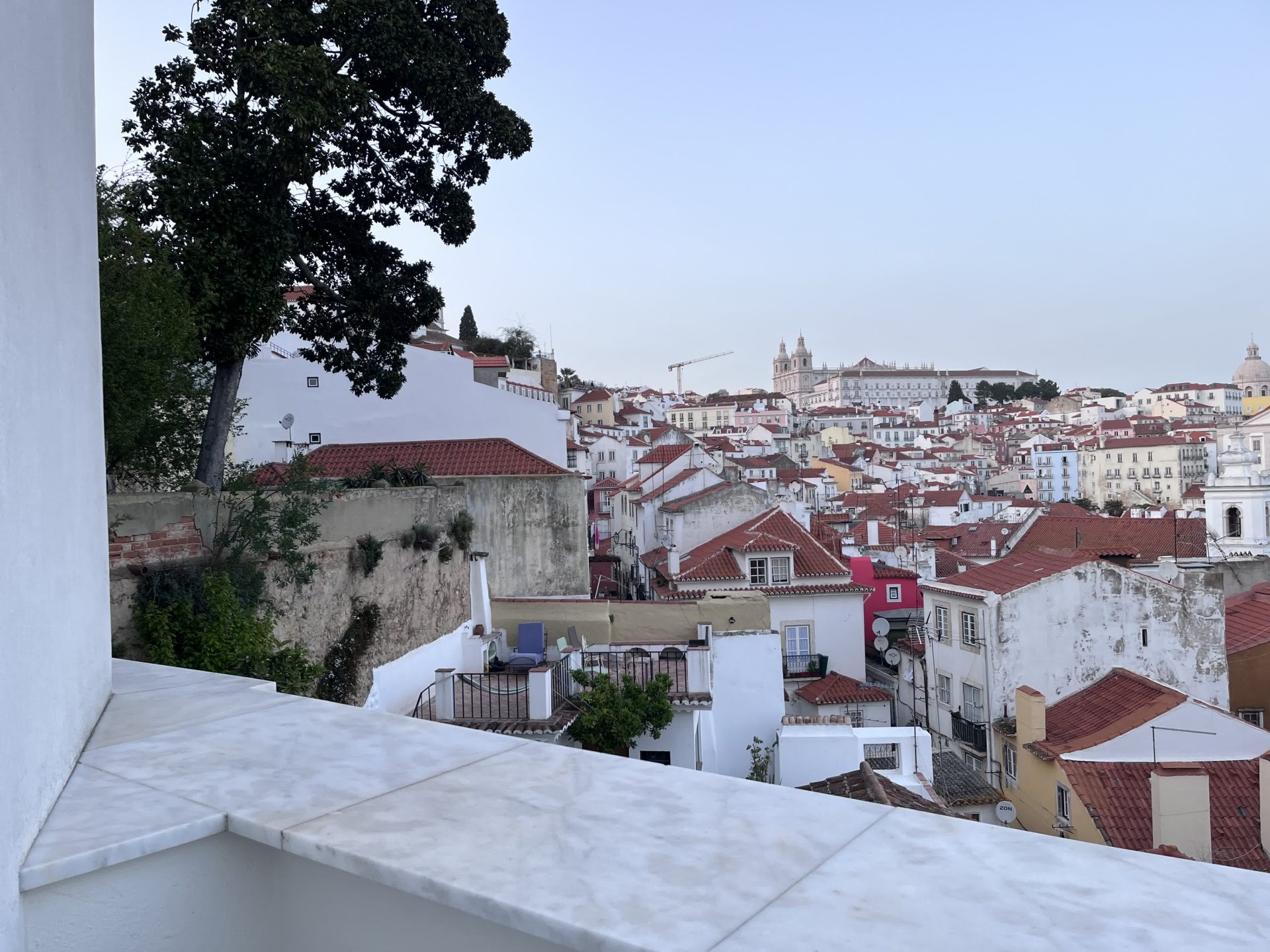 View over Lisbon rooftops toward São Vicente de Fora